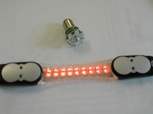 Item # CTI2009 - Wireless Helmet Brake LIght - One-to-One Design - 3rd Generation - 18 LEDs TPR Receiver - 3157, 1157 and Black Box (Two -Wire) Transmitter